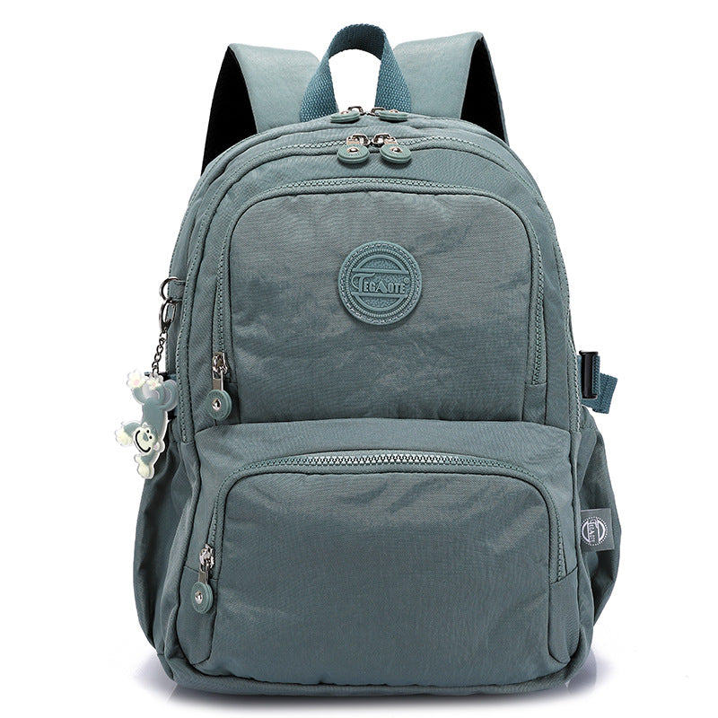 Blue backpack with visible brand logo on a white background