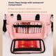 Pink backpack with elastic rope design and waterproof compartment, holding makeup brushes and a book.