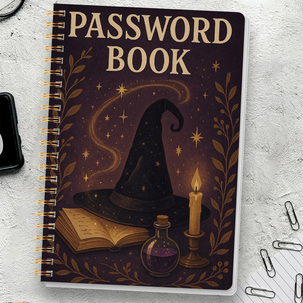 Password book with witch hat, book, and candle design on a textured surface.