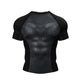 A black short-sleeve athletic compression shirt with a textured geometric chevron pattern on the chest, displayed on a clean white background.