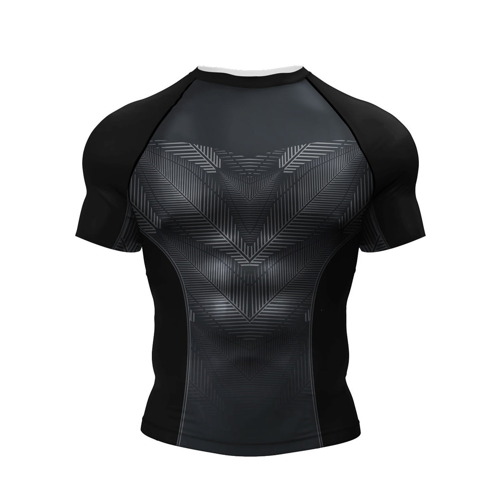 A black short-sleeve athletic compression shirt with a textured geometric chevron pattern on the chest, displayed on a clean white background.
