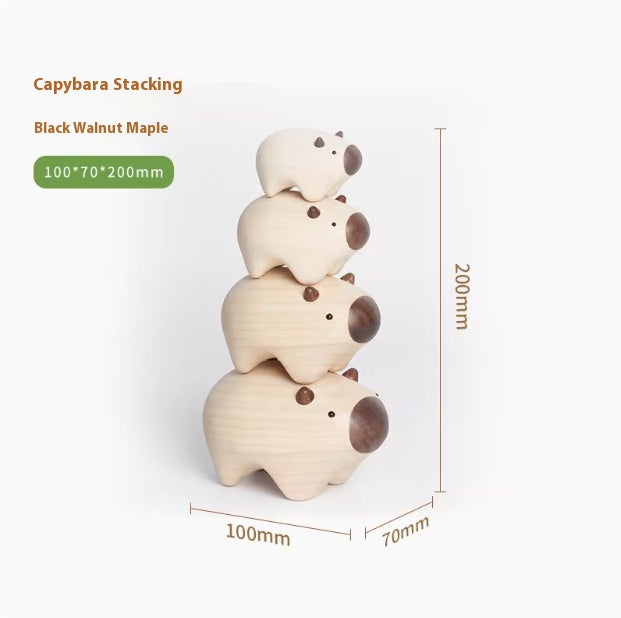 Four stacked capybara figurines made of light natural wood with dark brown snouts and ears, shown with dimension labels indicating 100mm width, 70mm depth, and 200mm height on a white background.