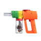 Colorful toy gun with a transparent barrel featuring a cartoon dog design on a white background