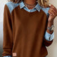 Brown sweatshirt with denim collar and cuffs worn by a person.
