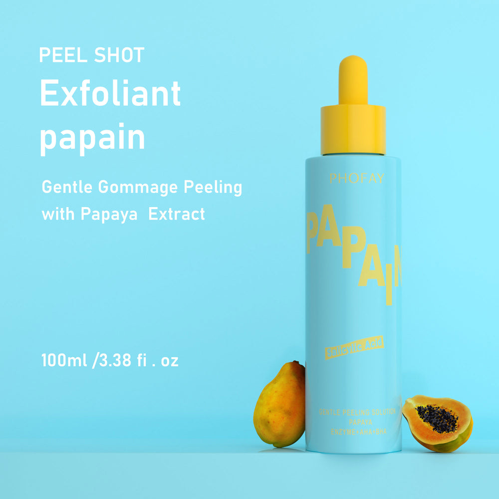 Exfoliant papain bottle with papaya fruit on a blue background