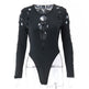 Black bodysuit with cut-out design on a white background