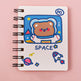 Notebook with a cute bear astronaut illustration on a pink background