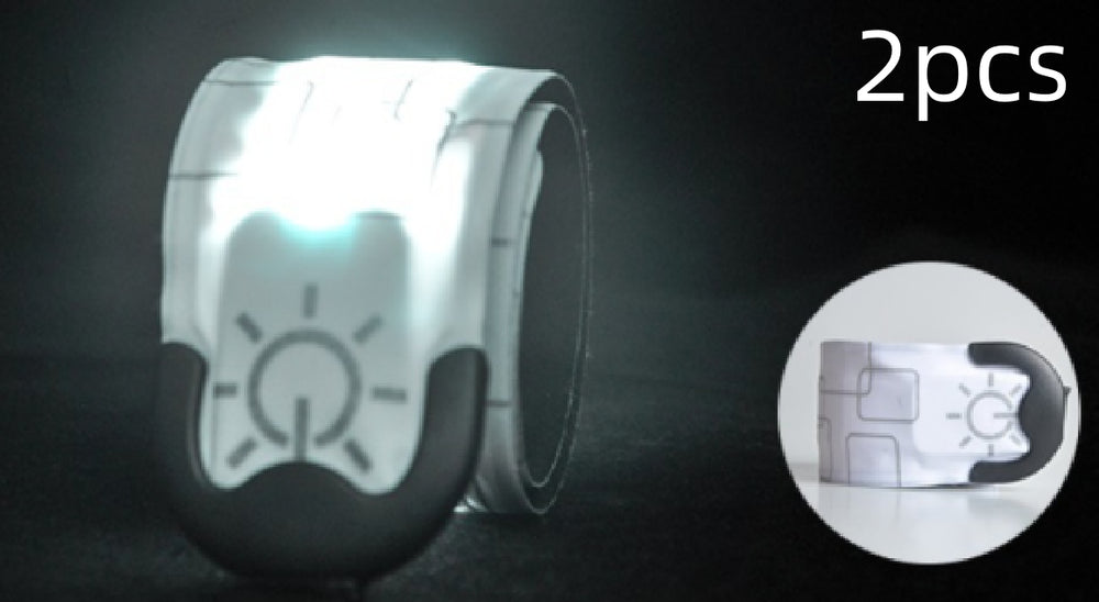 Reflective safety bands with a glowing light on a dark background, labeled '2pcs'.