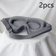 Gray sleep mask on a white fabric background with '2pcs' text.