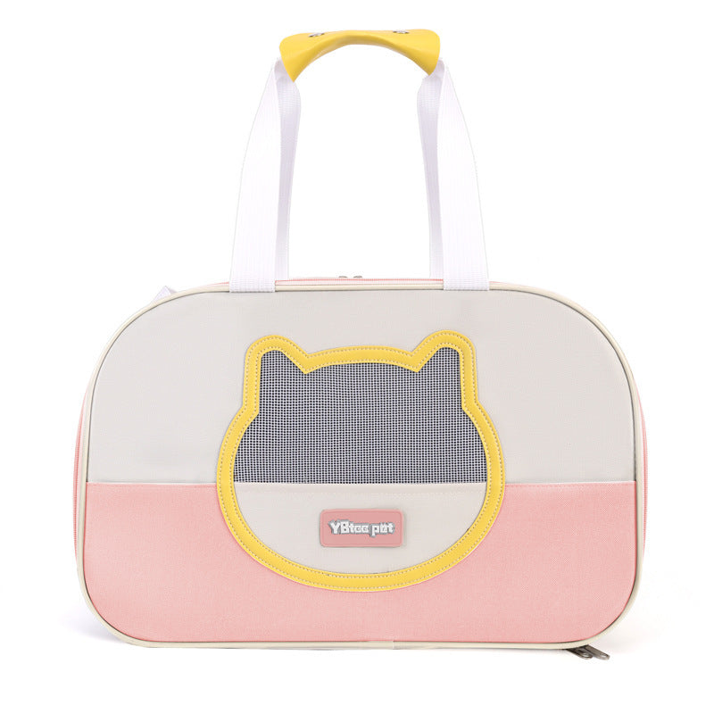 Pet carrier with cat face design and pink base on a white background