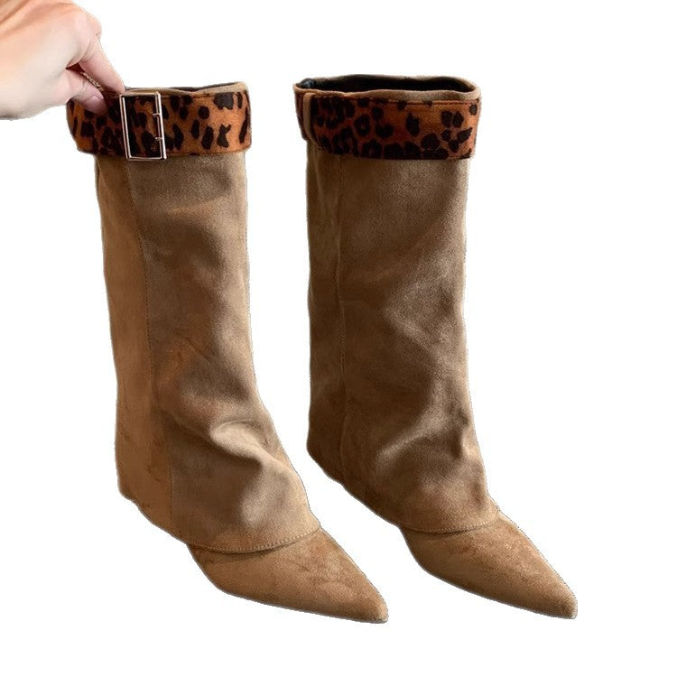 Brown knee-high boots with leopard print accents on a white background