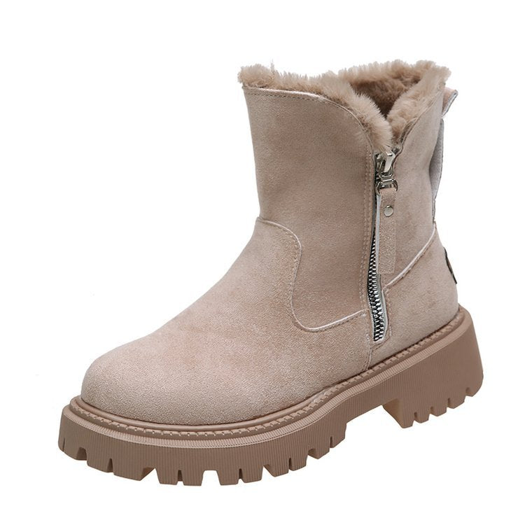 Beige winter boot with fur lining and zipper on a white background
