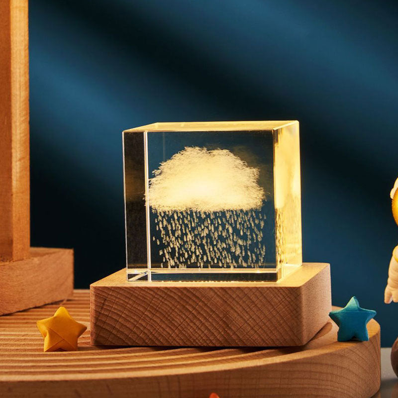 Glass block with water droplets on a wooden base against a dark blue background