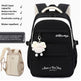 Black and beige backpack with white accents, featuring a cute white plush sheep keychain, shown alongside feature text and a smaller inset view of the backpack.