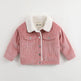 Pink corduroy jacket with white sherpa lining on a light gray background