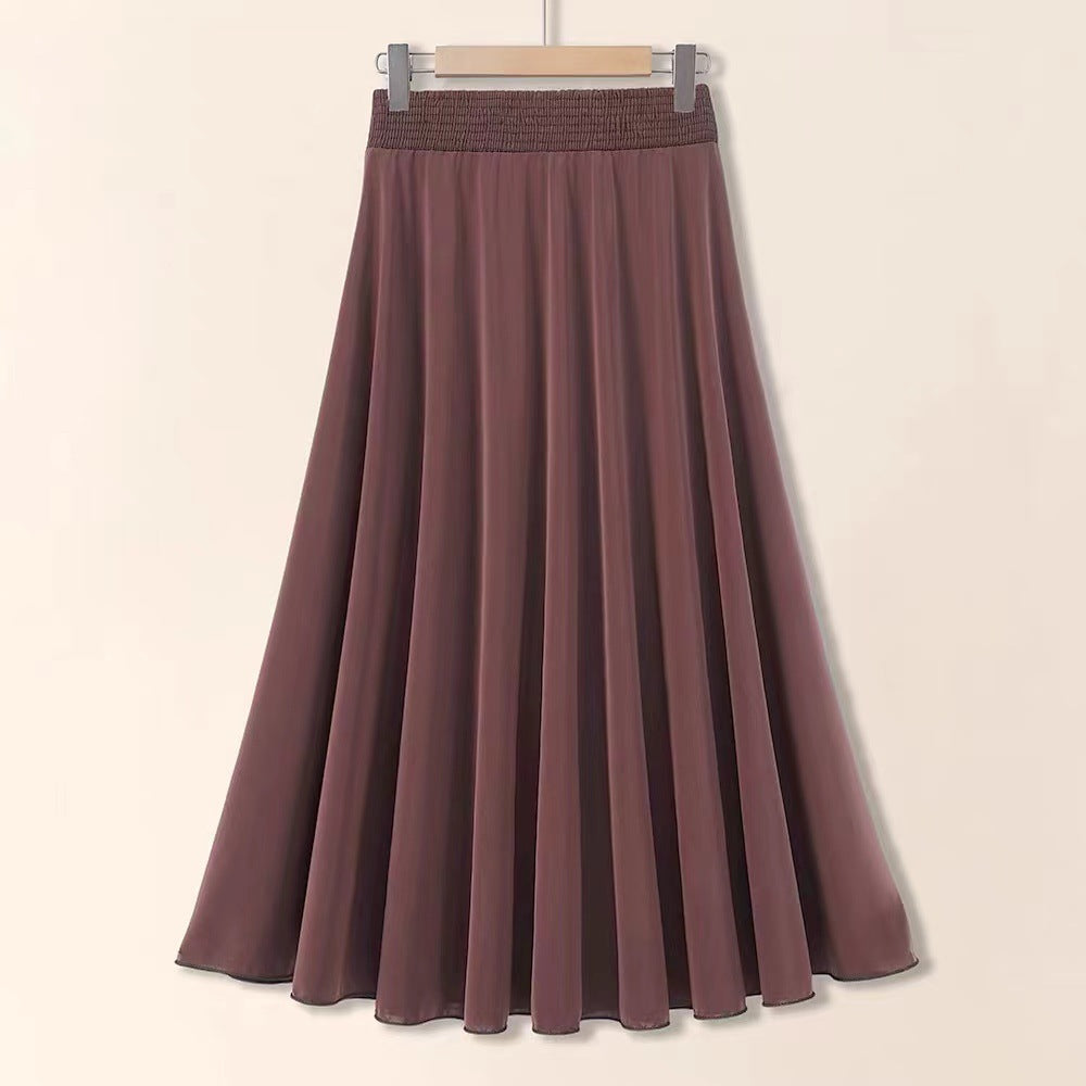 Brown skirt on a hanger against a beige background