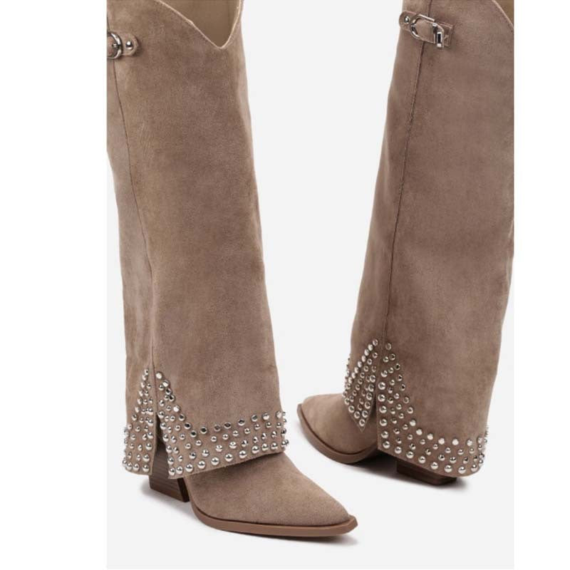 Brown suede boots with decorative studs on a white background