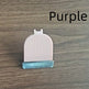 White grooming brush with blue handle on a wooden surface, labeled 'Purple'.