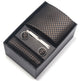 Men's accessory set with tie, pocket square, and cufflinks in a black box on a white background