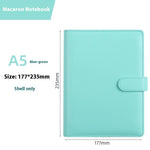 Blue-green notebook with dimensions and product name on a white background