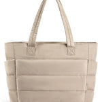 Beige tote bag with multiple compartments on a white background