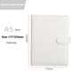 White notebook with dimensions labeled on a gray and white background