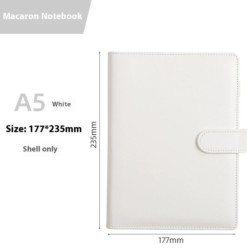 White notebook with dimensions labeled on a gray and white background