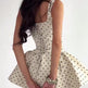 White polka dot strapless dress detail