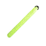 Yellow slap bracelet with black clasp on a white background