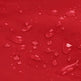 Red surface with scattered clear water droplets, shown as a close-up texture shot.