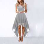 Woman wearing a gray high-low dress on a white background