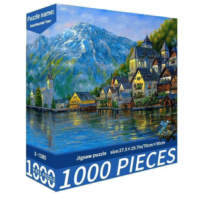 Jigsaw puzzle box with a scenic mountain village design on the cover