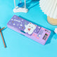 Purple pencil case with cartoon bear design on a blue background