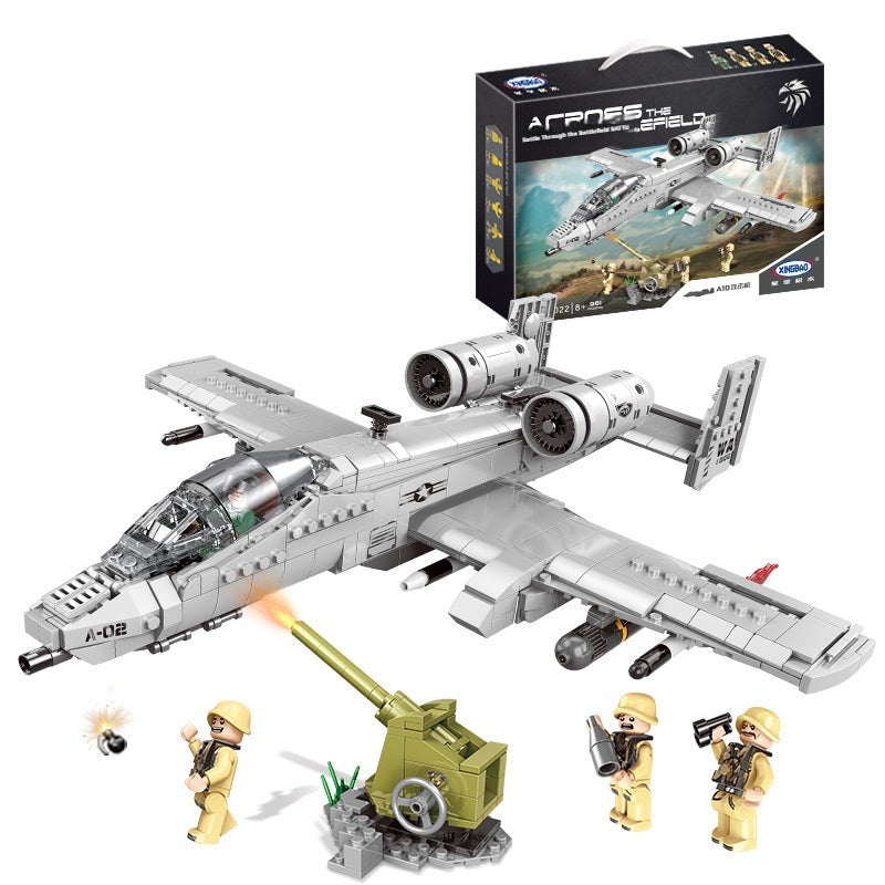 Toy airplane set with figures and cannon, featuring a model of an airplane in the packaging.