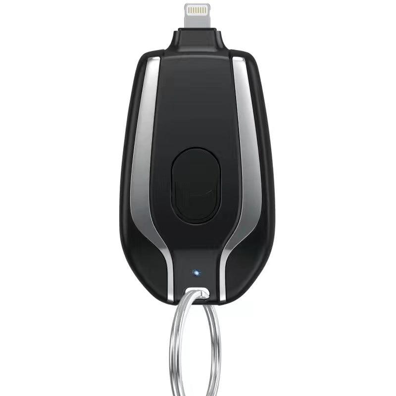 Black car key fob with keychain on a white background