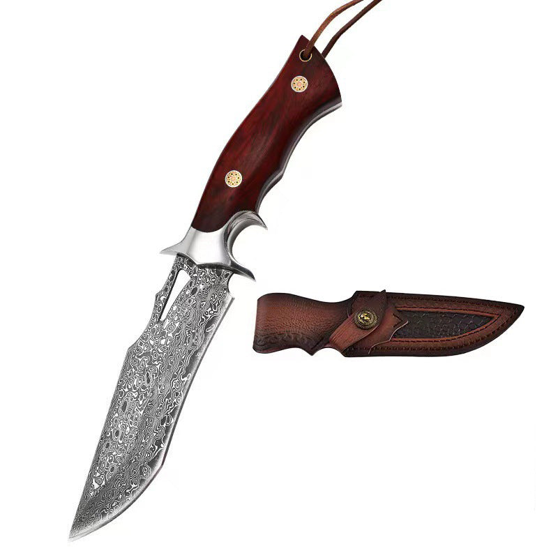 Decorative knife with a wooden handle and sheath on a white background