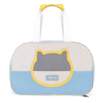 Pet carrier with cat face design on a white background