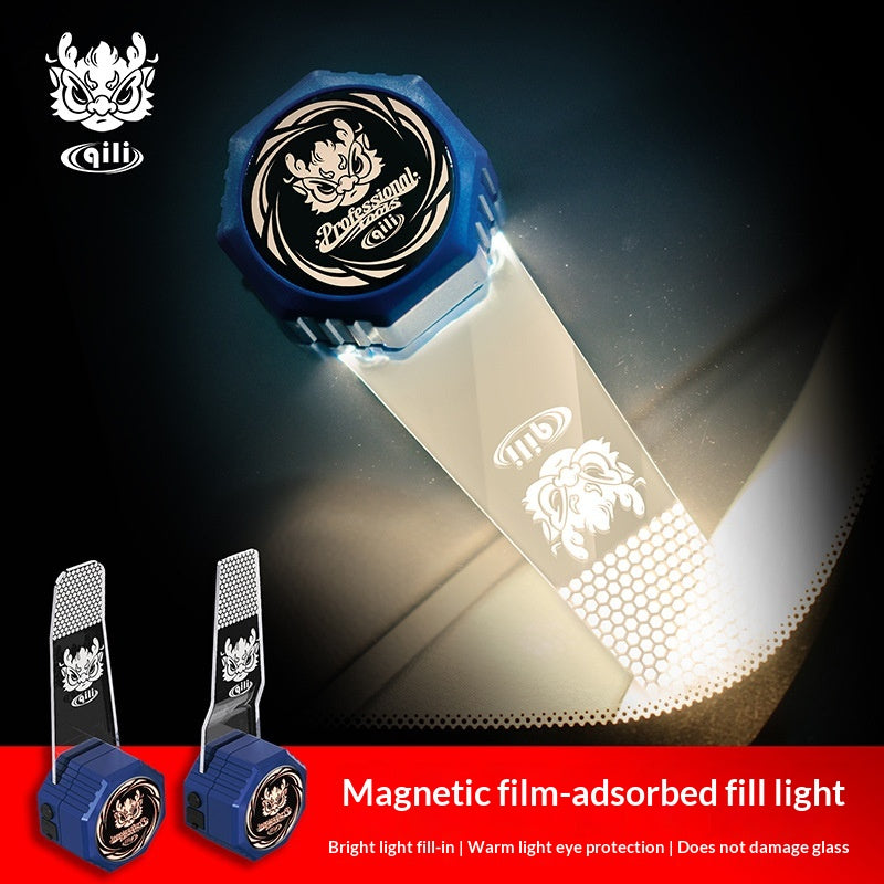 A blue and clear magnetic film-adsorbed fill light shown illuminated, with two smaller inset views of the same product on a dark background. The product has a blue cap with a circular black-and-white logo and a transparent strip with a white printed emblem.