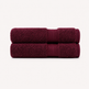 Two folded bath towels in a deep burgundy color, stacked vertically on a clean, light off-white background. Pure Cotton Bath Towel Set – Burgundy & Turquoise (74x33cm to 170x95cm)