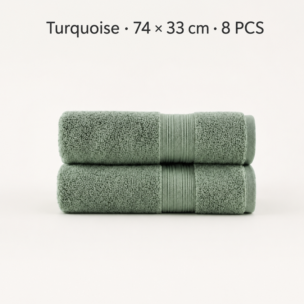 Two folded turquoise towels stacked on a light gray background, with text at the top reading 'Turquoise • 74 × 33 cm • 8 PCS'.
