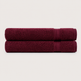 Two folded bath towels in a deep burgundy color, stacked horizontally on a light off-white background. Pure Cotton Bath Towel Set – Burgundy & Turquoise (74x33cm to 170x95cm)