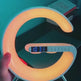 G-Shaped LED Lamp with Bluetooth Speaker & 15W Wireless Charger – App-Controlled Atmosphere Light for Bedroom